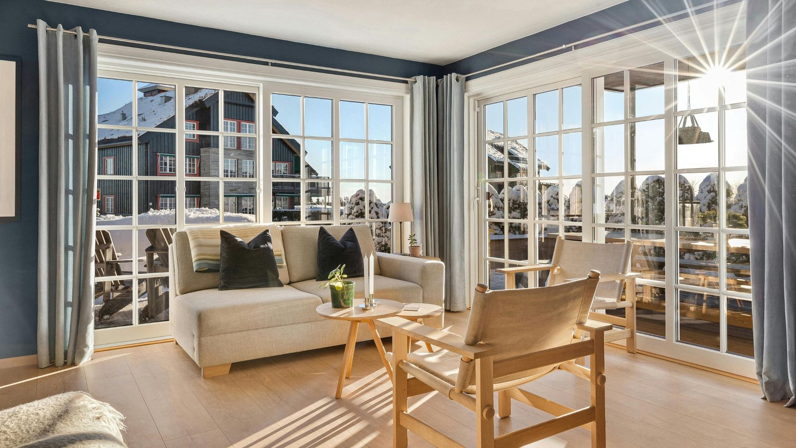 Bright Vaughan living room with large glass windows showcasing natural light and insulation, highlighting the benefits of energy-efficient windows.